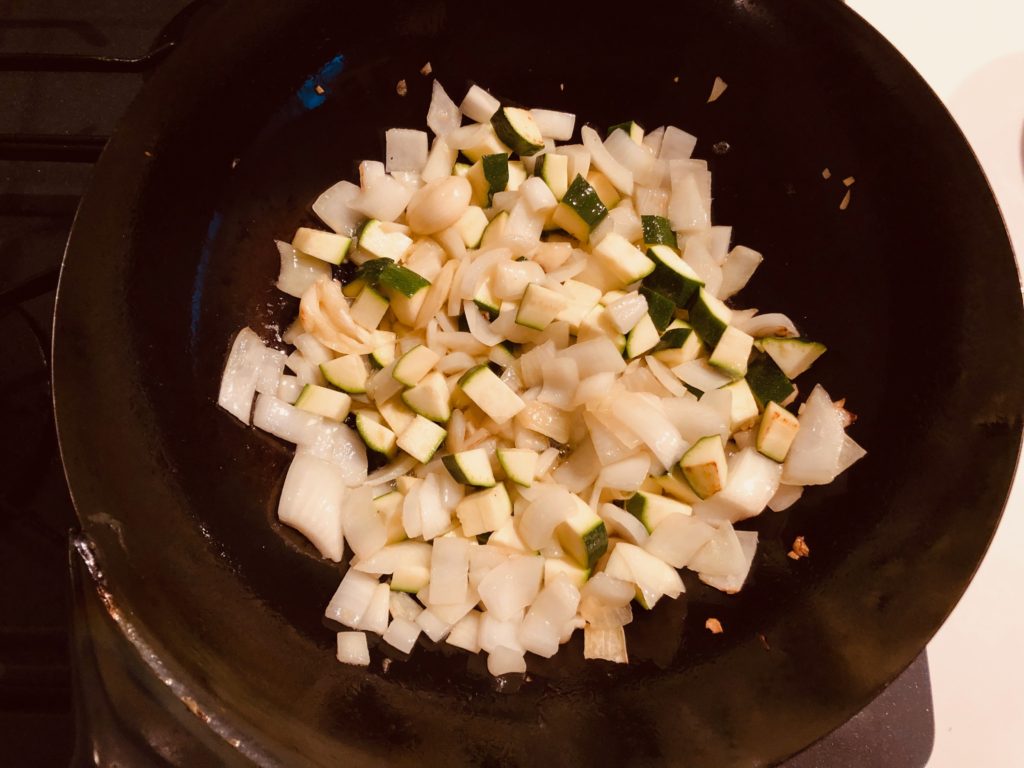 Onion, fry zucchini